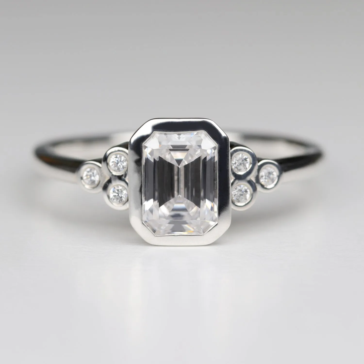 Emerald Cut Openwork Seven Stone Cluster Engagement Ring