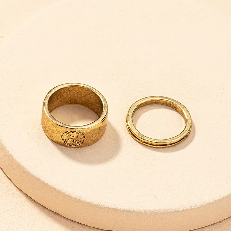 Regal Metal Textured Ring Set with Cross Border Charm