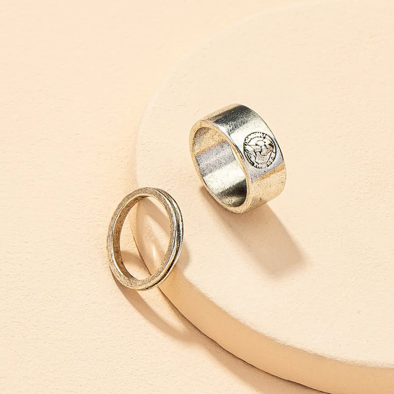 Regal Metal Textured Ring Set with Cross Border Charm